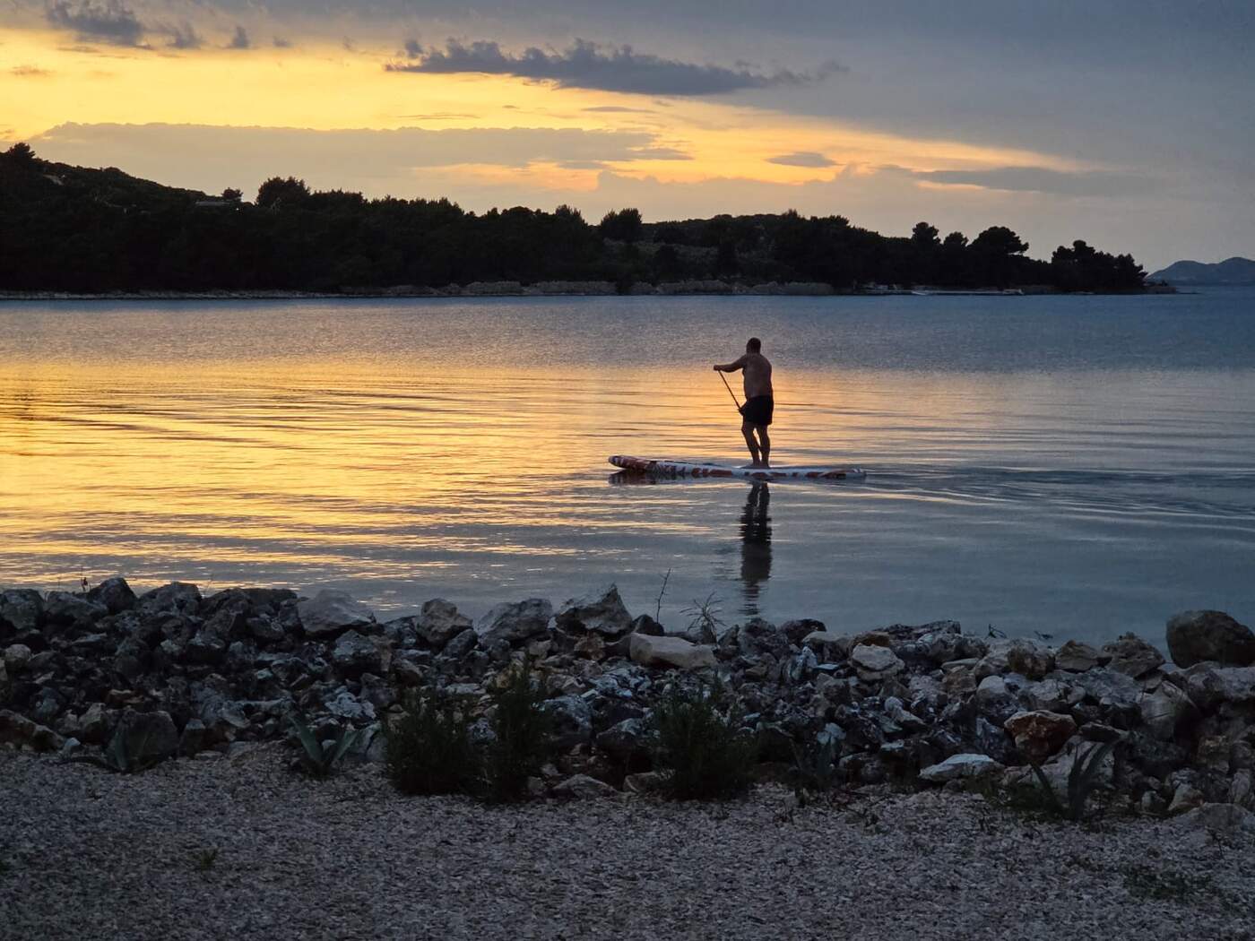 Paddleboarding at sunset